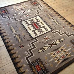 American Dakota Textiles Decor Voices Collection: Storm Catcher Chestnut Area Rugs