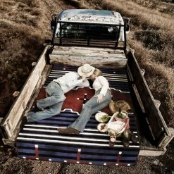 American Dakota Textiles Decor Voices Collection: Big Chief Blue Area Rugs