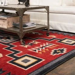 American Dakota Textiles Voices Collection: Old Crow Red Area Rugs