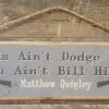 OutWest Shop Decor Wall Sign Movie Quote: Matthew Quigley. This Ain't Dodge City And You Ain't Bill Hickock