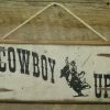 OutWest Shop Wall Sign Advice: Cowboy Up