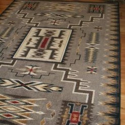 American Dakota Textiles Decor Voices Collection: Storm Catcher Chestnut Area Rugs