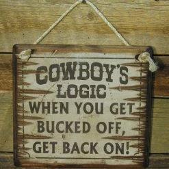 OutWest Shop Wall Sign Advice: Cowboy's Logic When You Get Bucked Off Get Back On!